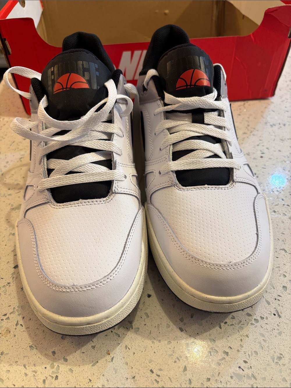 Nike White and Black Low-Top Sneakers with Orange Logo